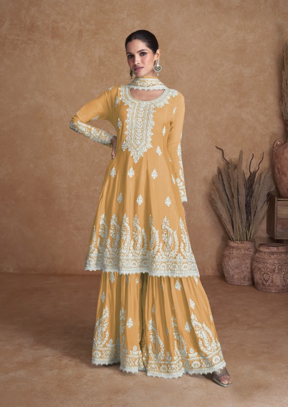 Peach readymade suit with floral vine embroidered crop top, full-sleeve  embroidery long shrug & sharara pants